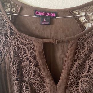 Woman’s vintage lace detailed A line swing dress with long bell sleeves.
